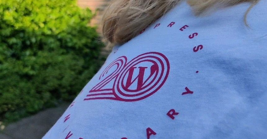 Close up of my daughter wearing WordCamp Europe 2023 t-shirt