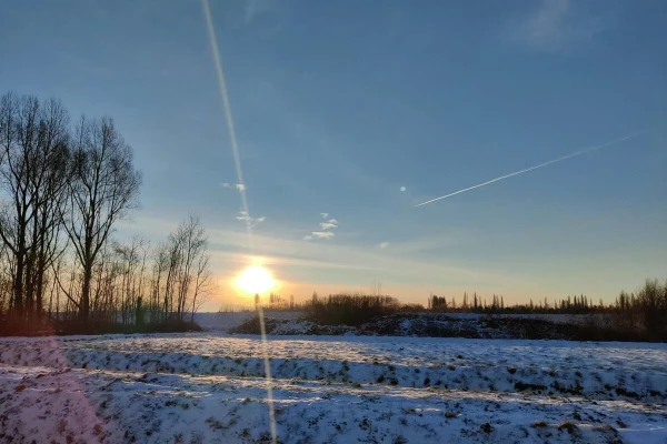 Snow landscape with sunrise