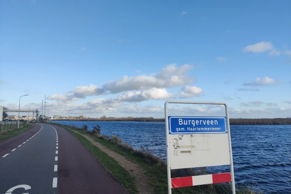 Picture of the Burgerveen city sign, on the street next to the Ringvaart canal