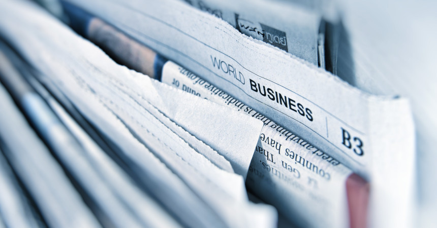 Some newspapers, folded and viewed from above