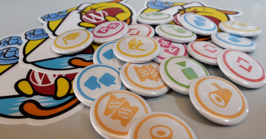 WordPress.org contributor pins on a table